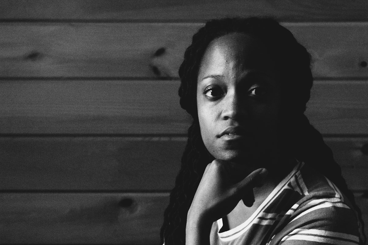 Young woman with a determined expression, representing personal injury clients seeking justice
